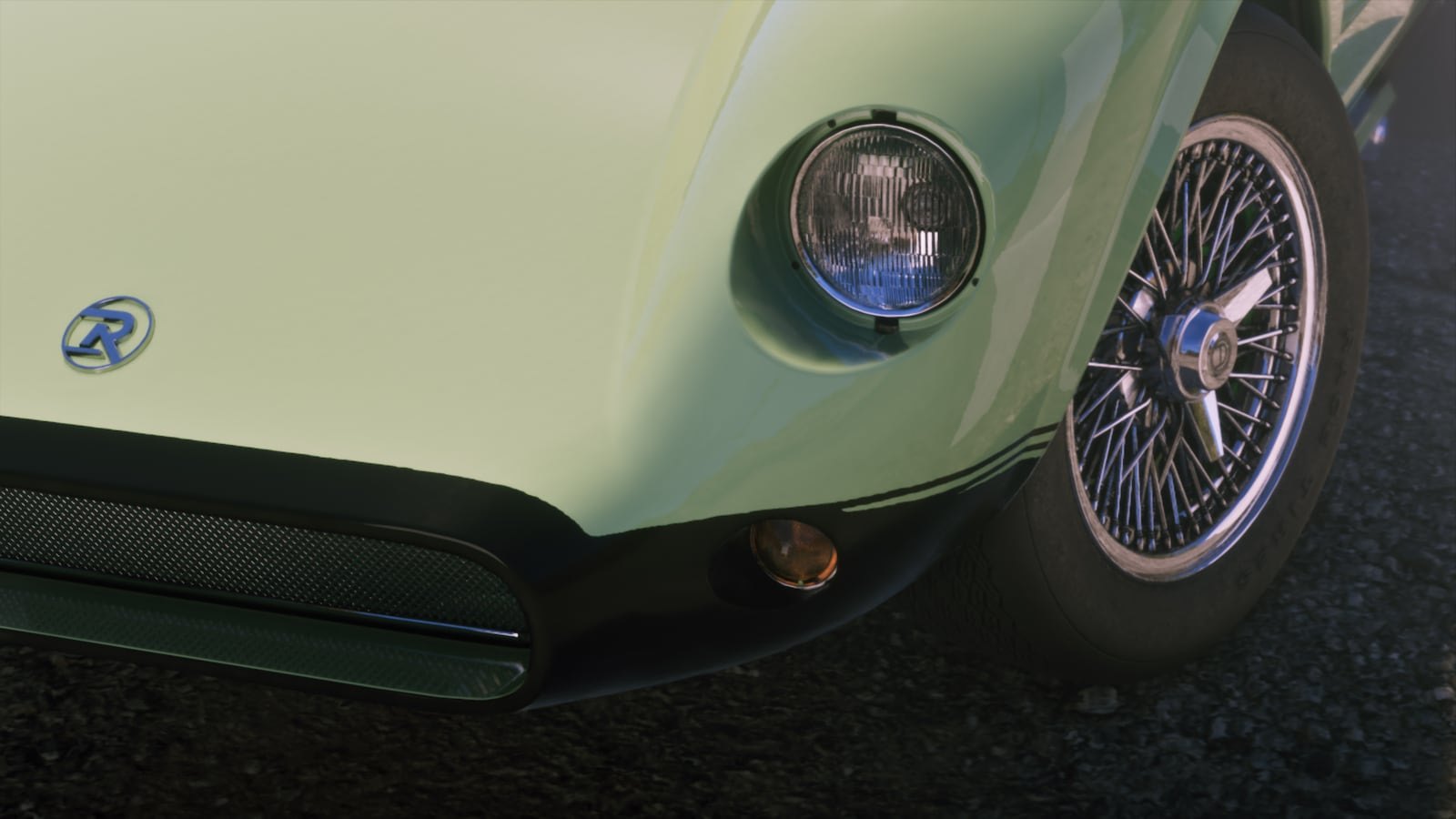 Close-up front corner view of a pale green classic sports car with wire spoke wheels and round headlights.