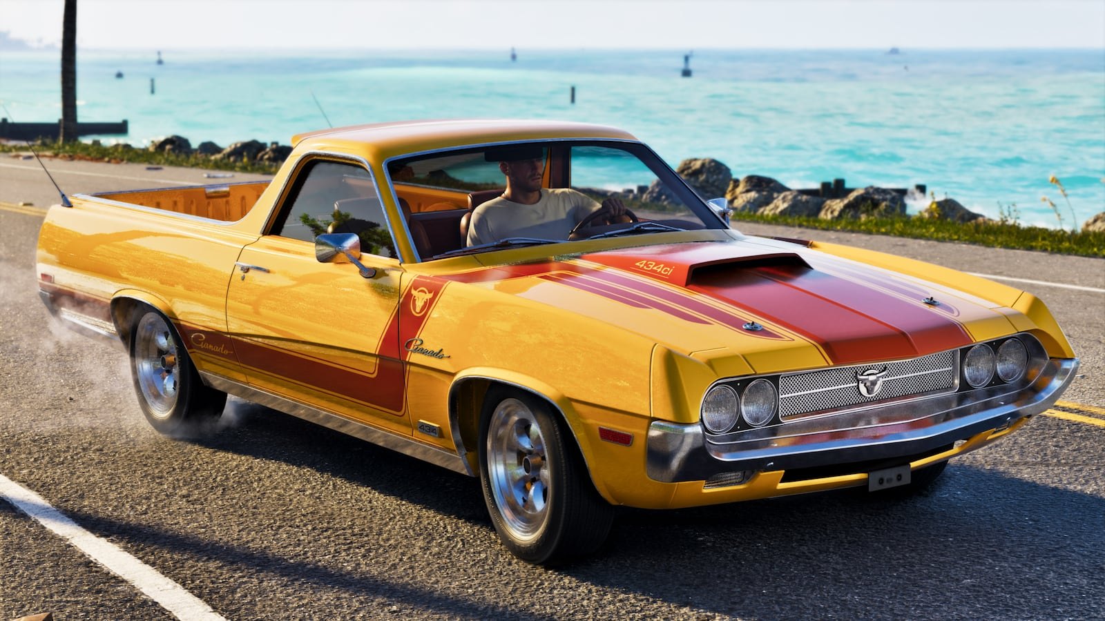 A yellow and red classic muscle car ute with a hood scoop drives along a coastal road with turquoise ocean in the background.